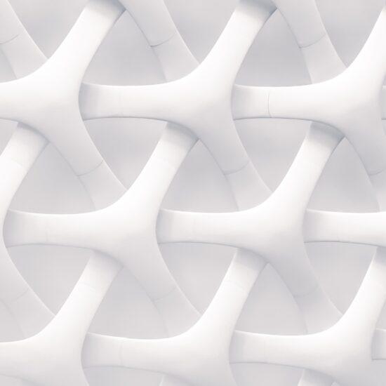 White image of shapes interwoven as part of an article about the link between branding and design.