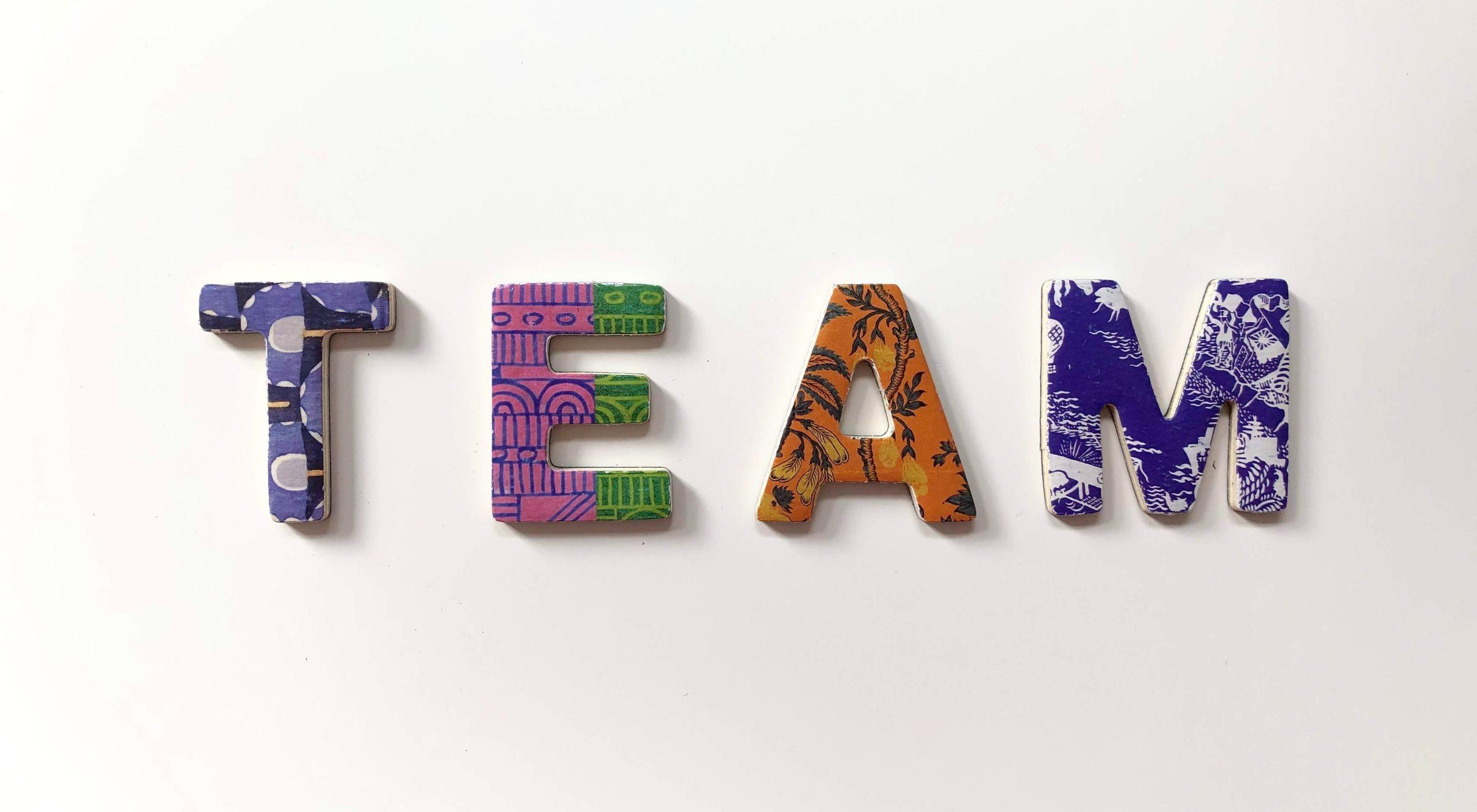 Colourful letters spelling the word 'team'.