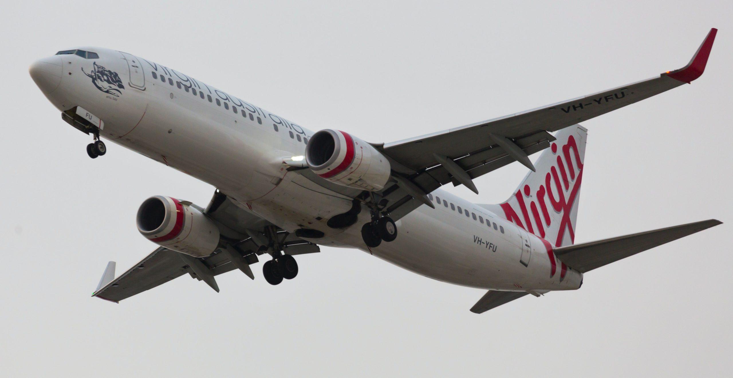 Virgin Australia plane flying in the sky.