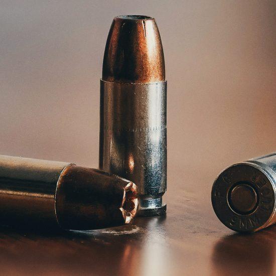 Bullets on a table as part of an article about the biggest mistake professional service firms make.