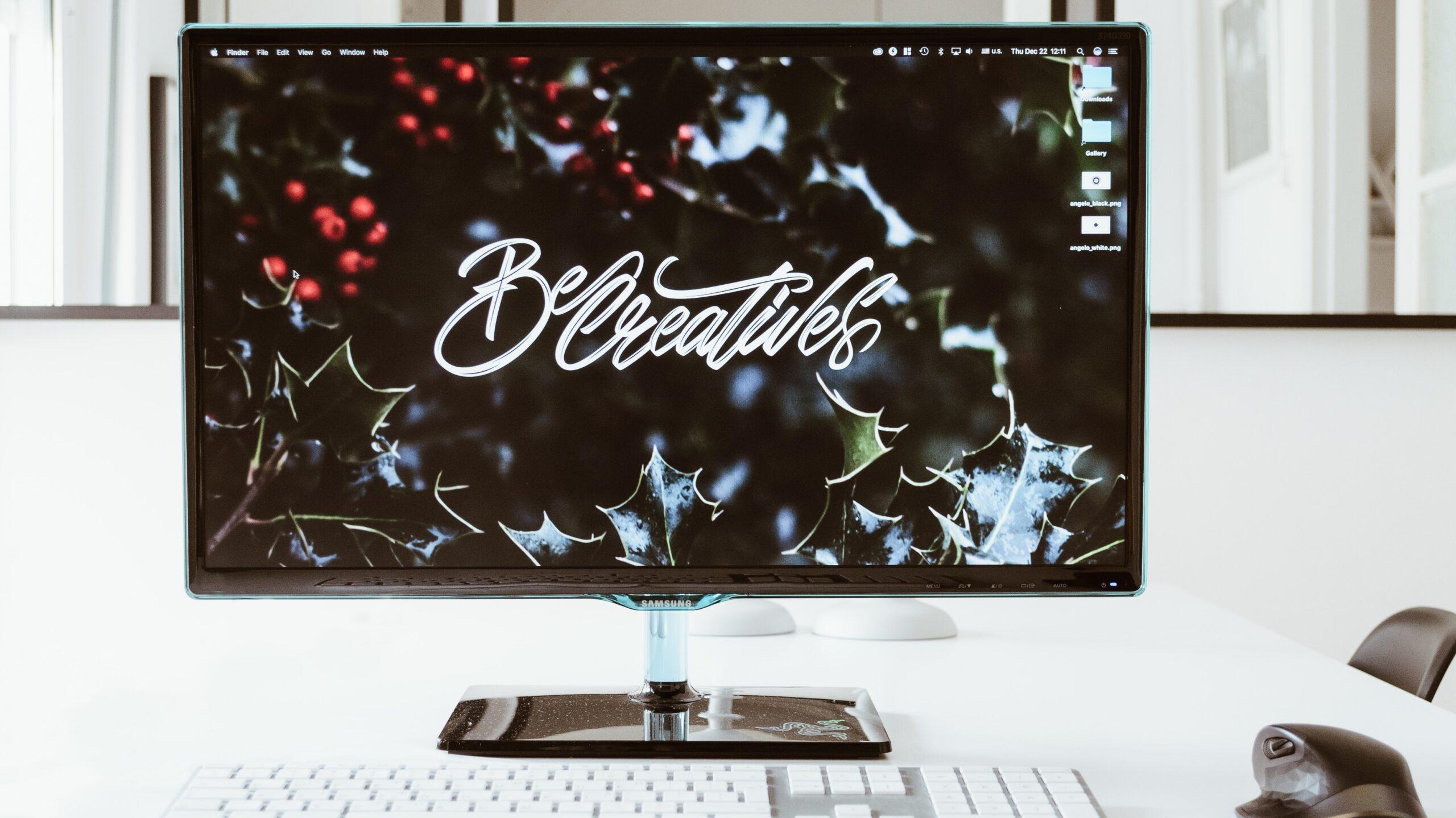 Website page displaying the words 'Be creative' against a backdrop of plants.
