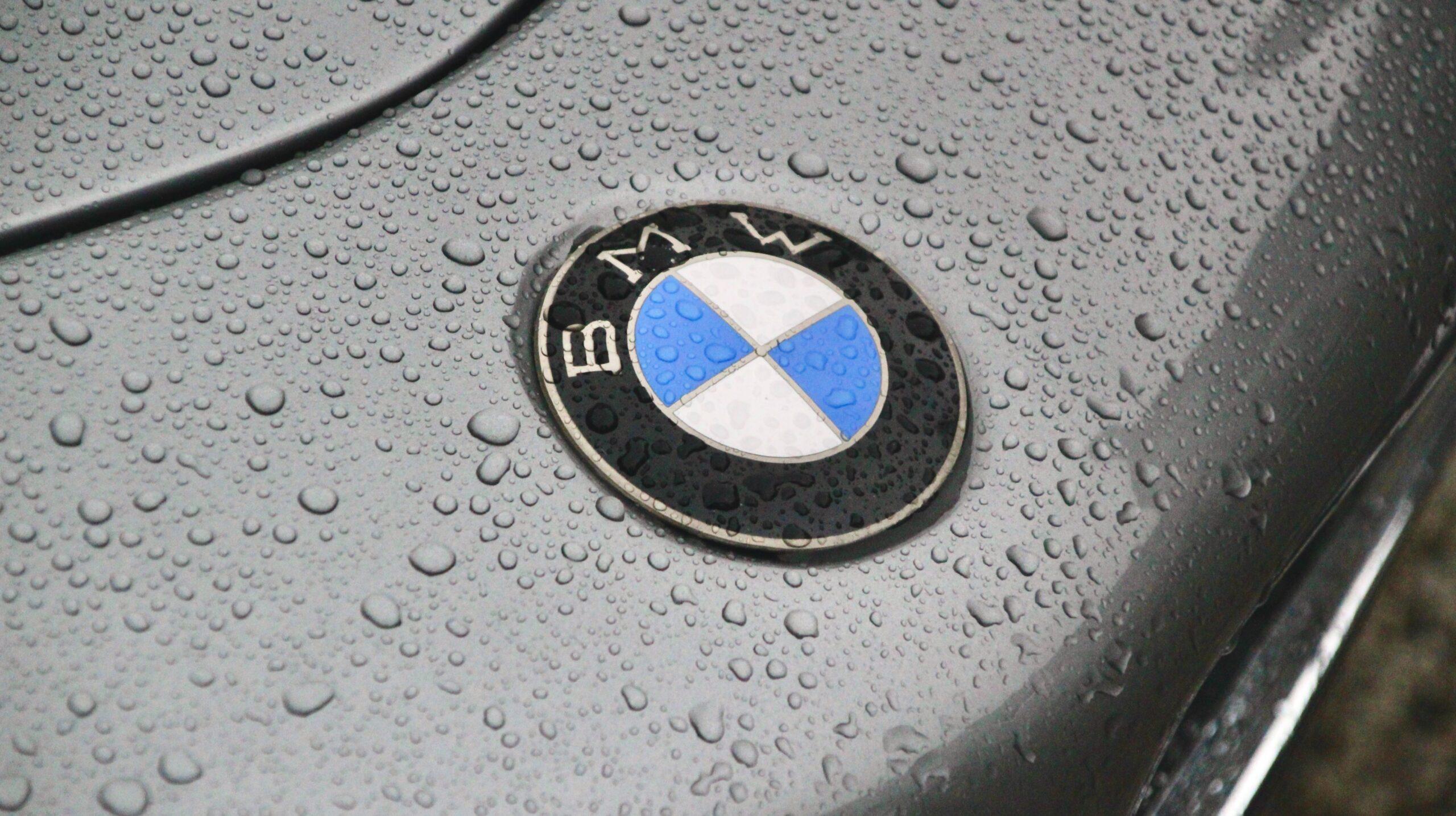 Close up of a BMW vehicle showing the brand's logo.