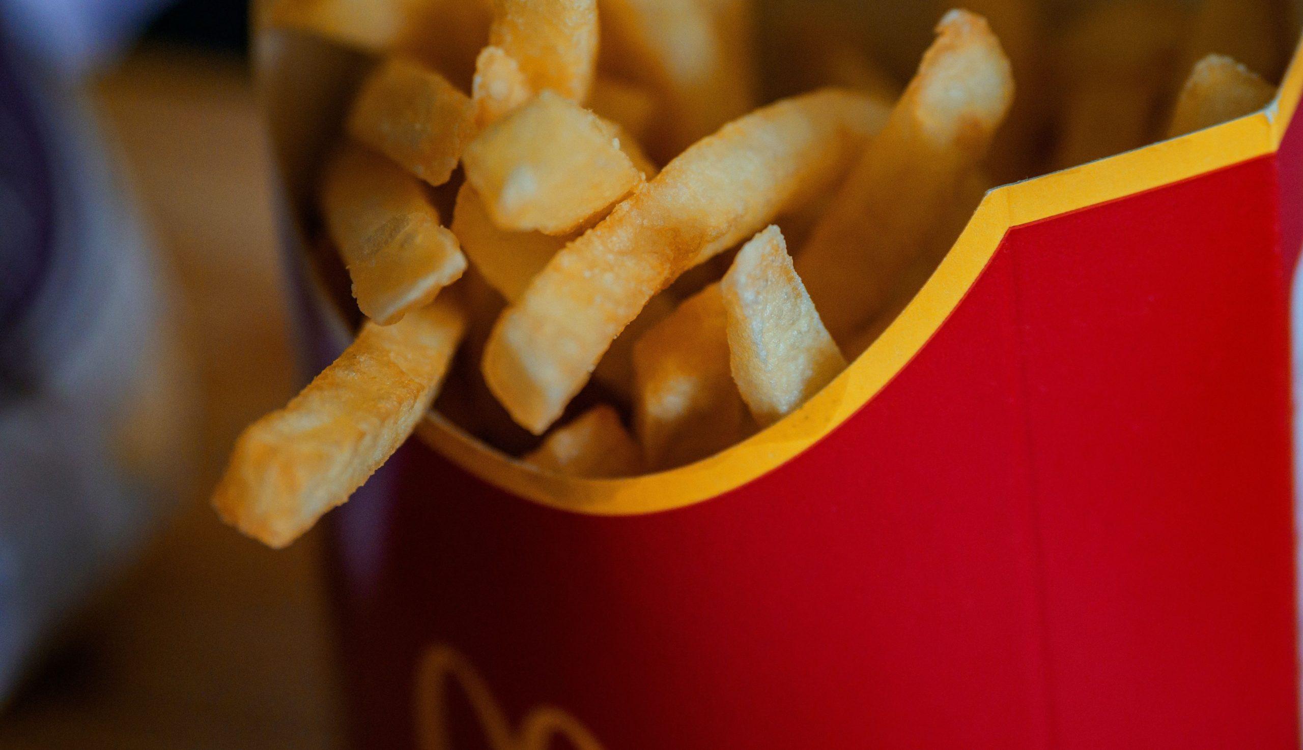 Close up of a basket of McDonald's fries.