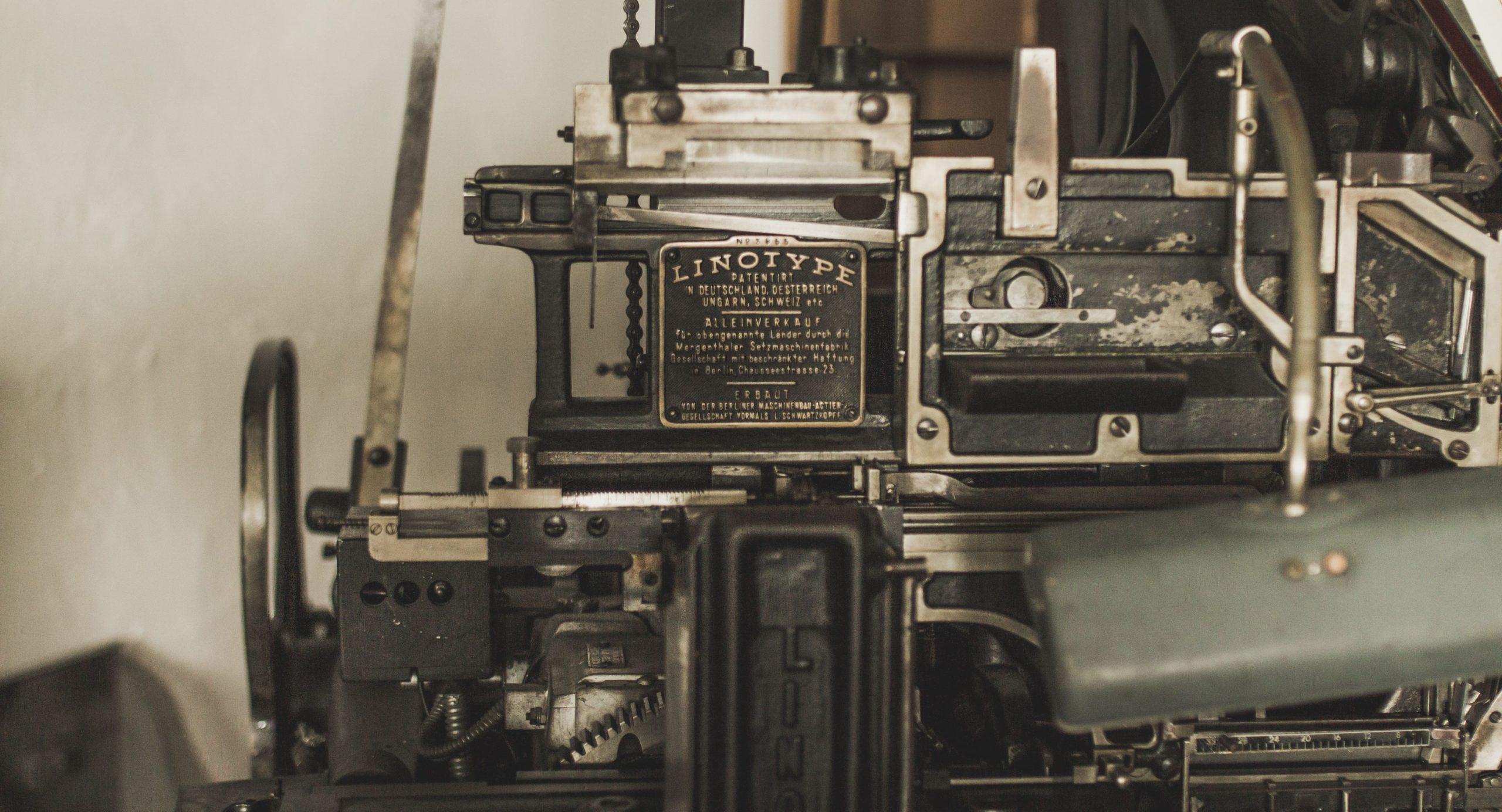 Close up of an old printing press.