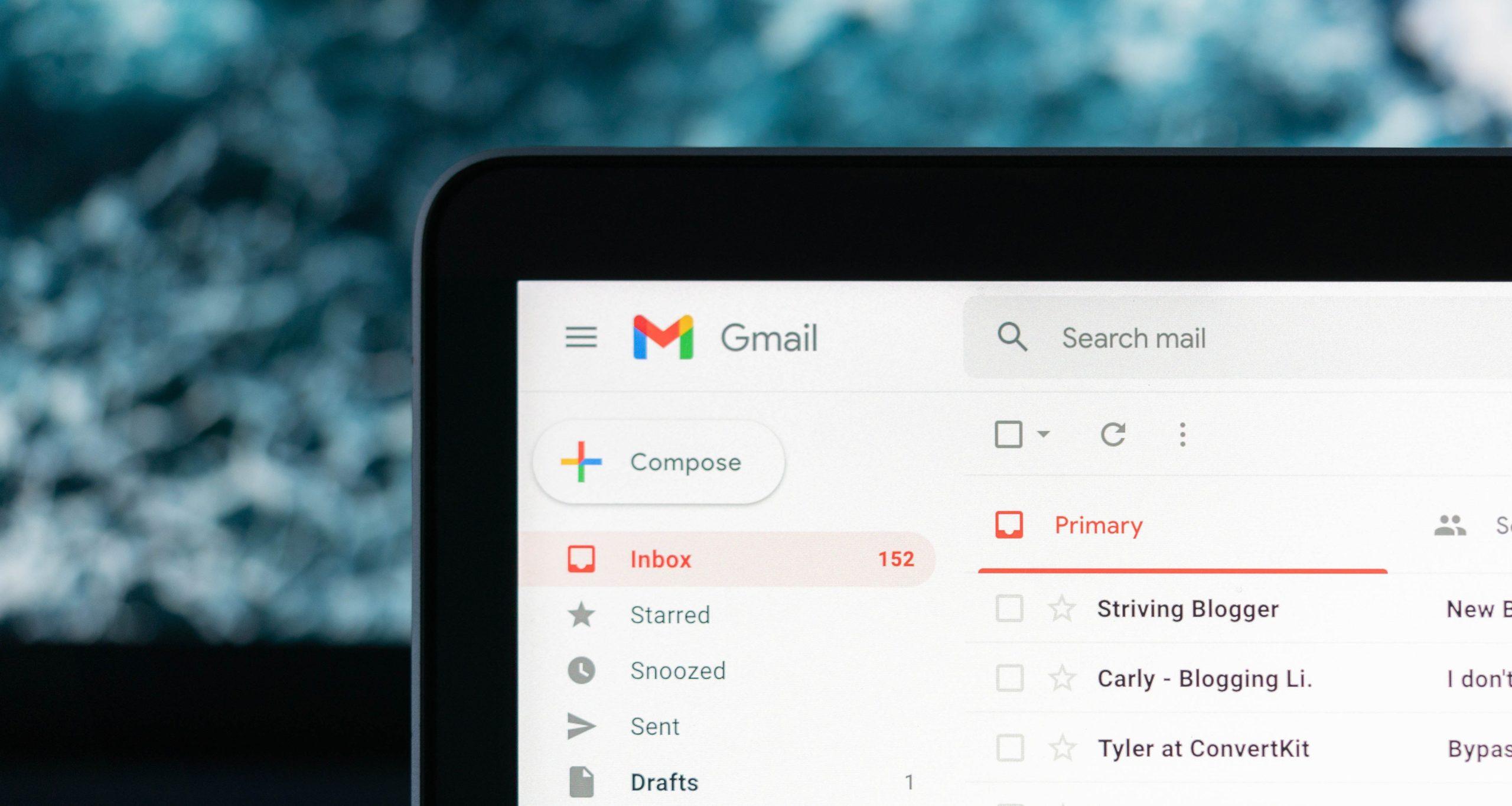 Laptop showing Gmail inbox.