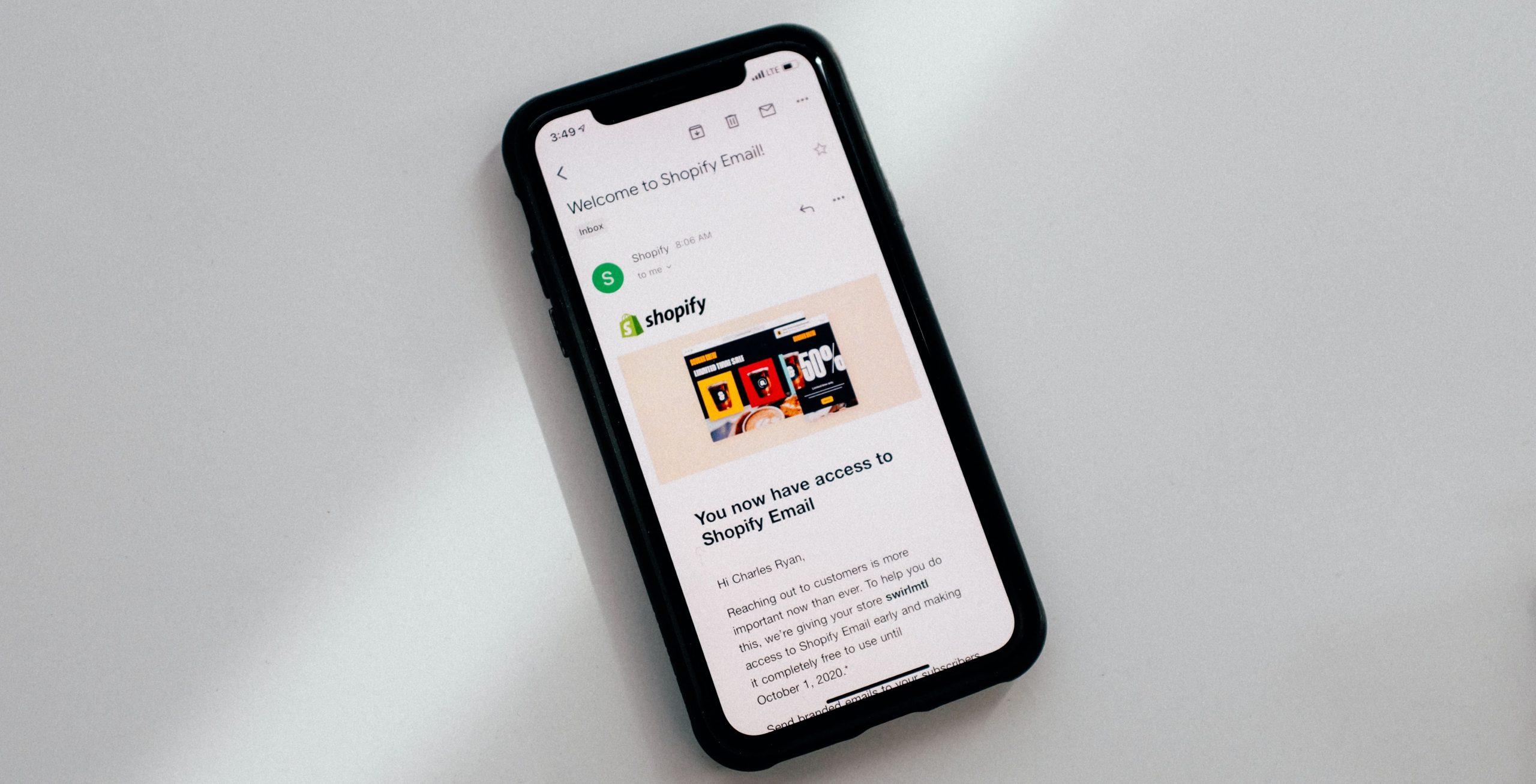 Smartphone displaying an email from Shopify.