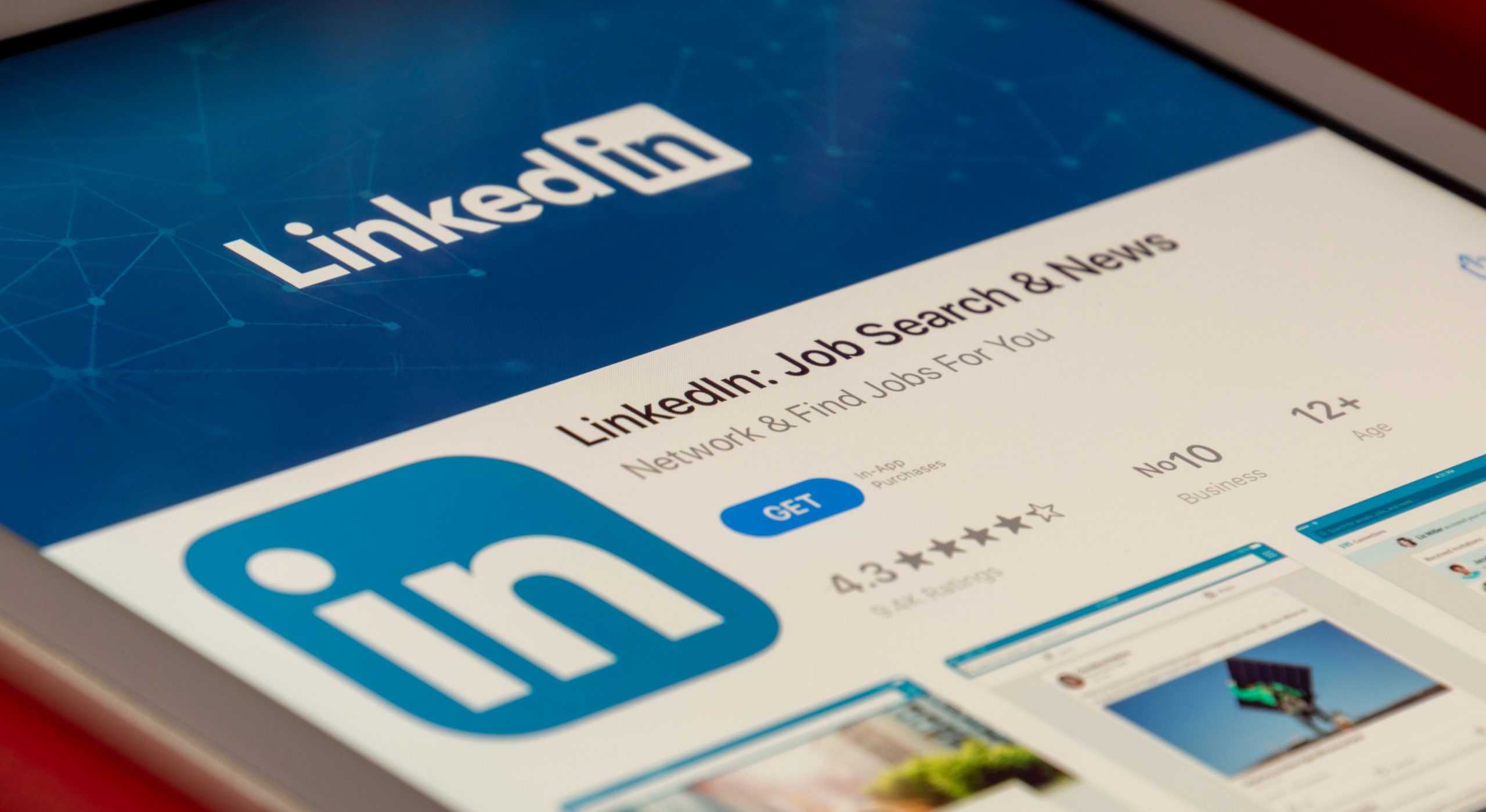 Tablet device displaying the LinkedIn homepage.