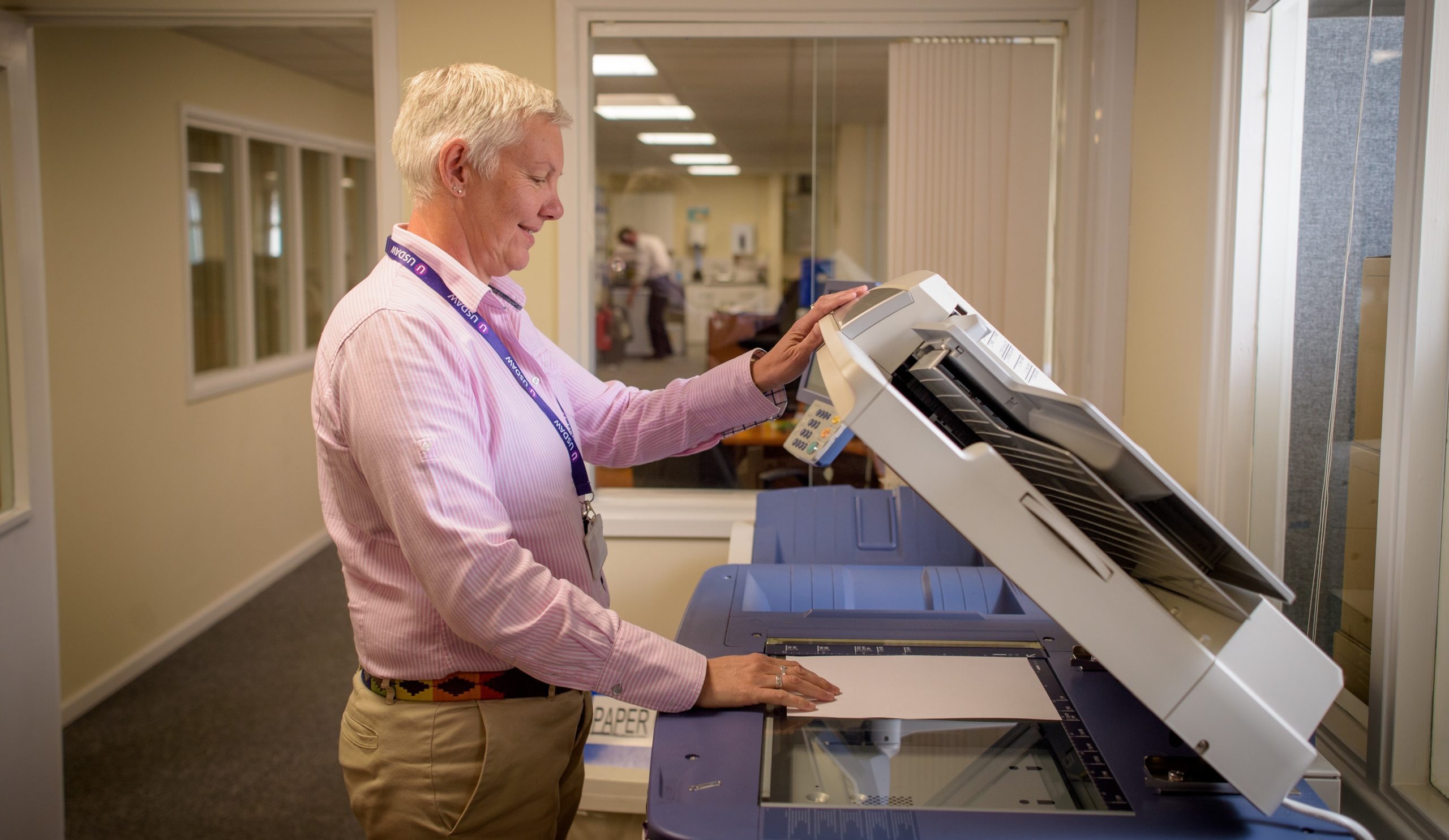 Man using a photocopier.