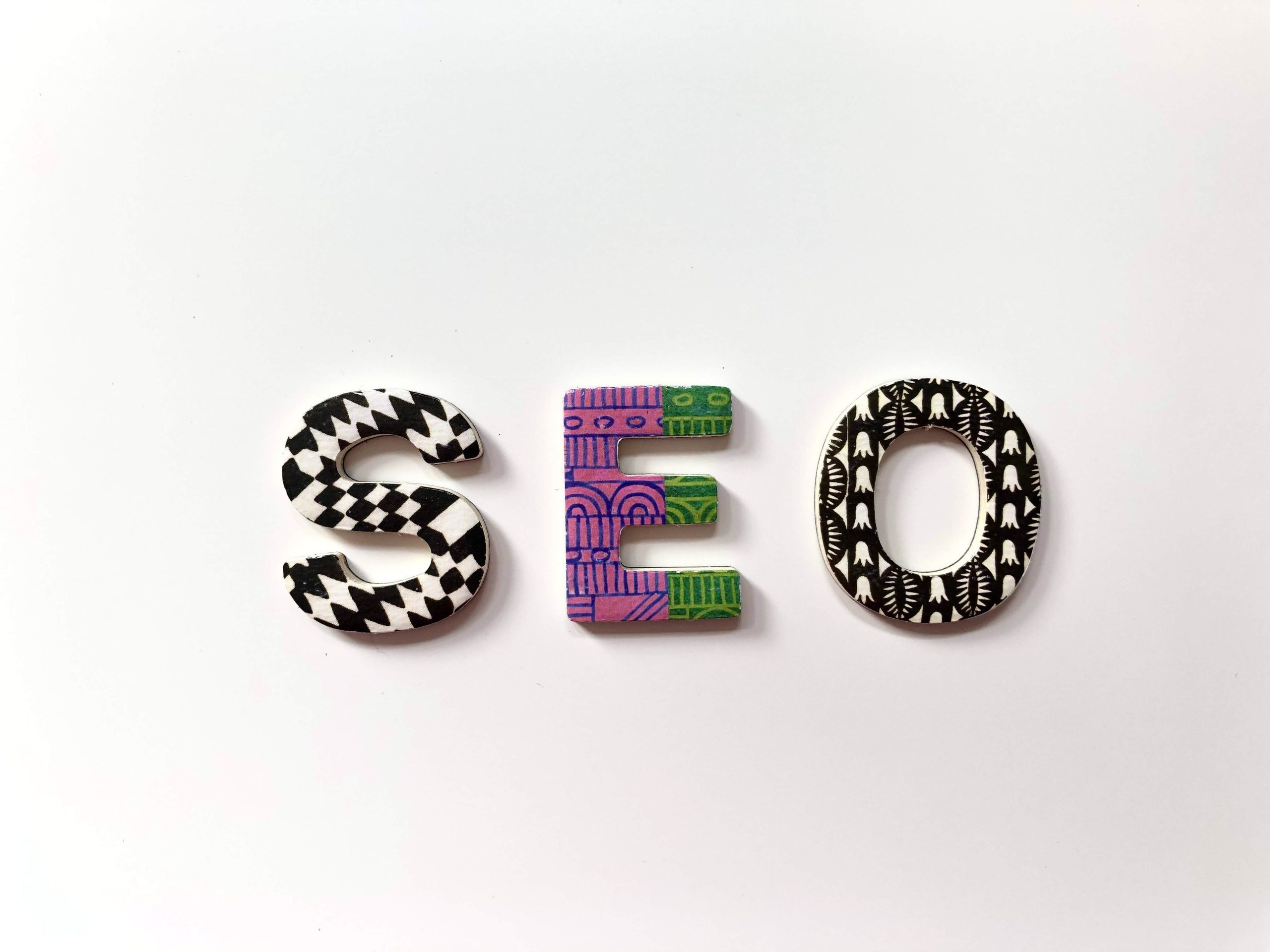 Graphic with the letters spelling out SEO.