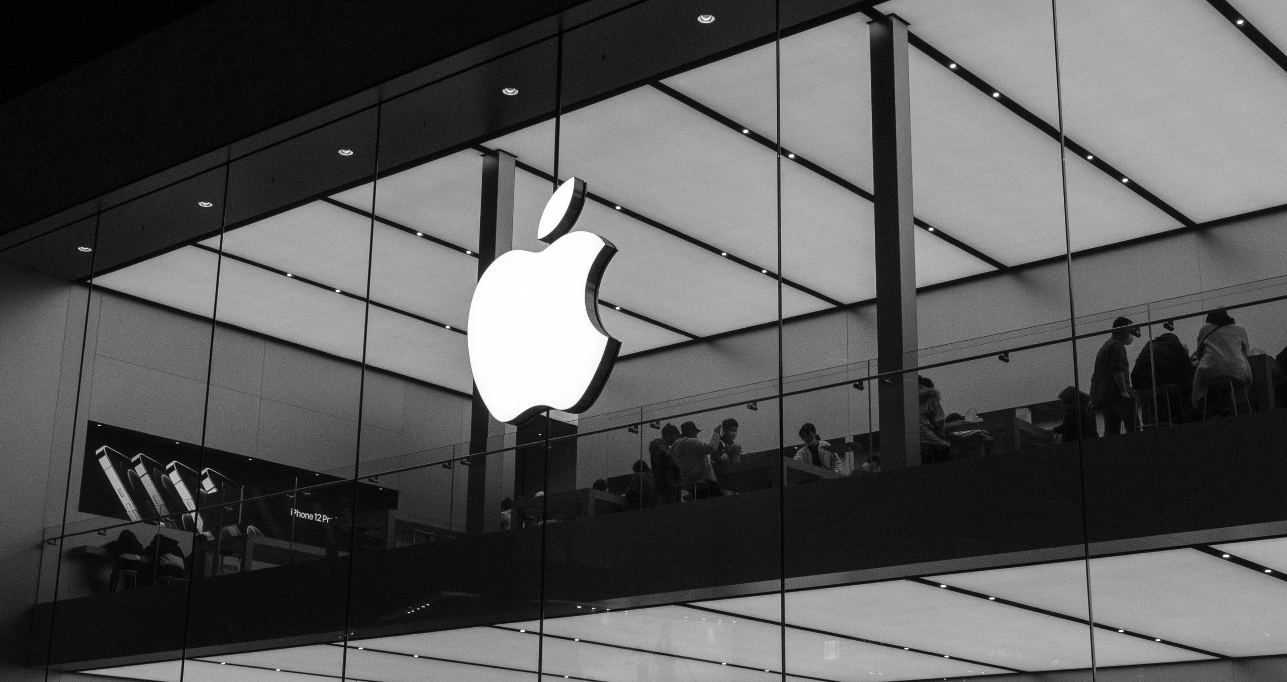 Apple logo on building window.