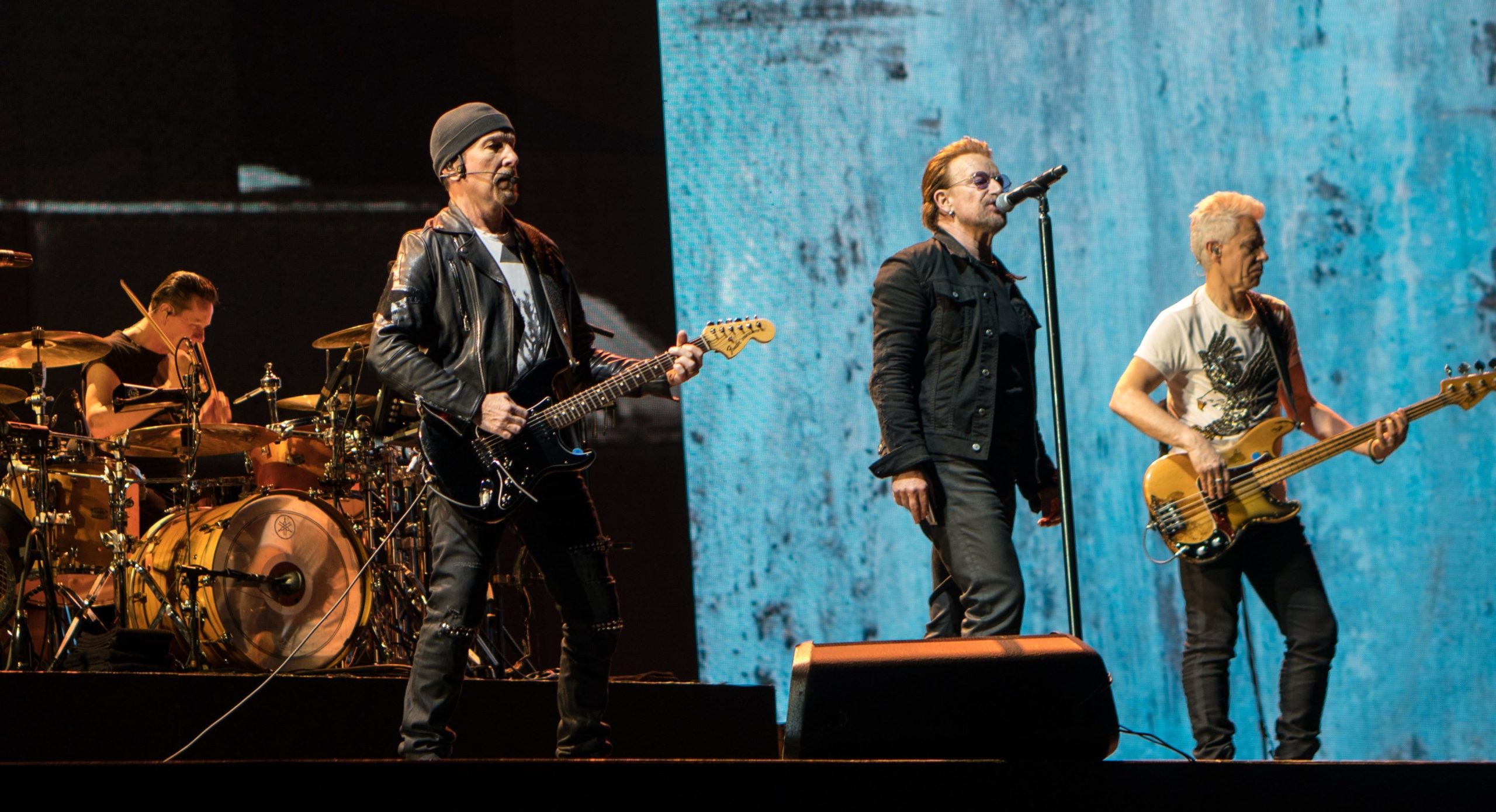 U2 performing on stage.
