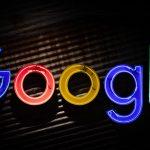 The Google logo on a darkened background as part of an article about Google fun facts.