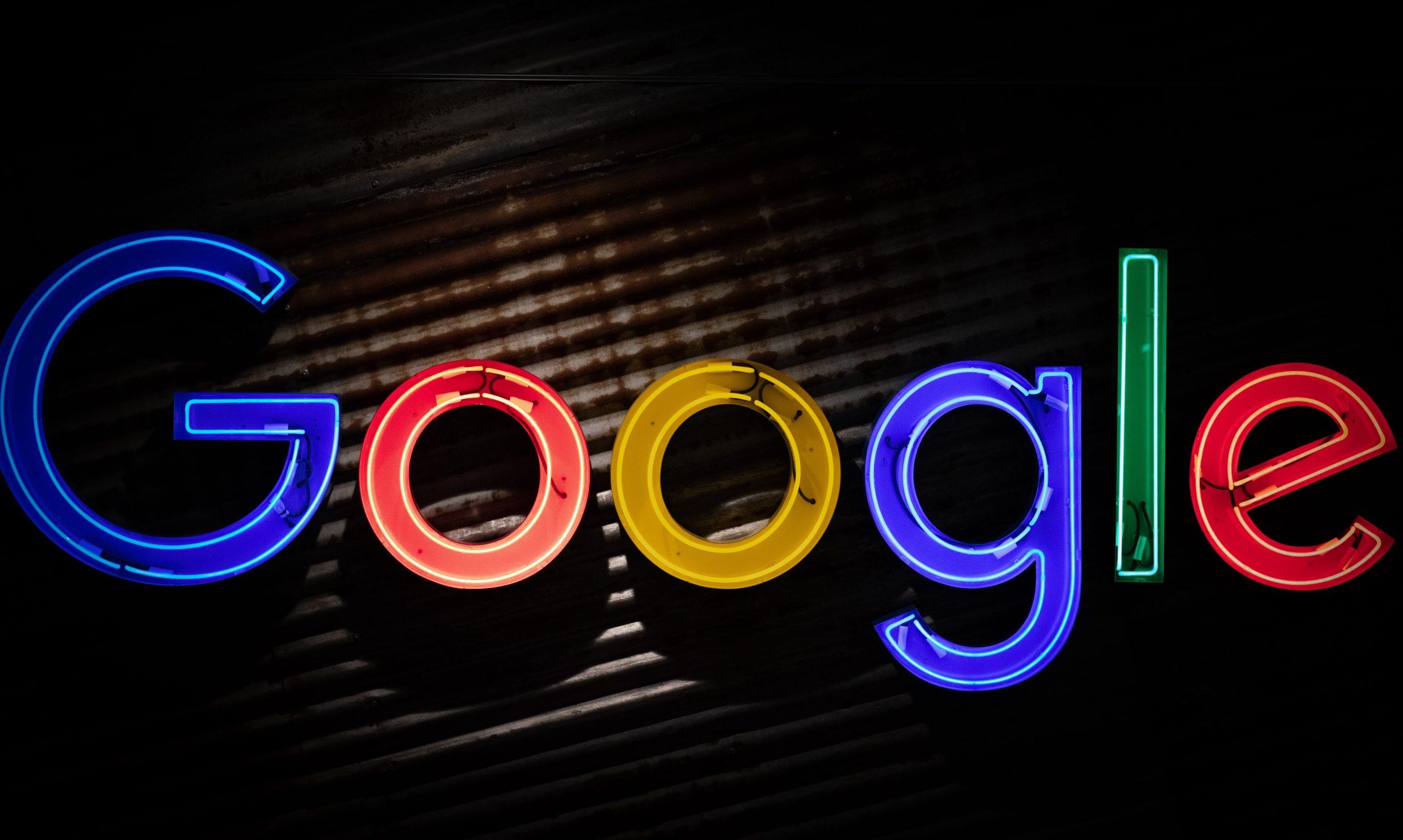 The Google logo on a darkened background as part of an article about Google fun facts.