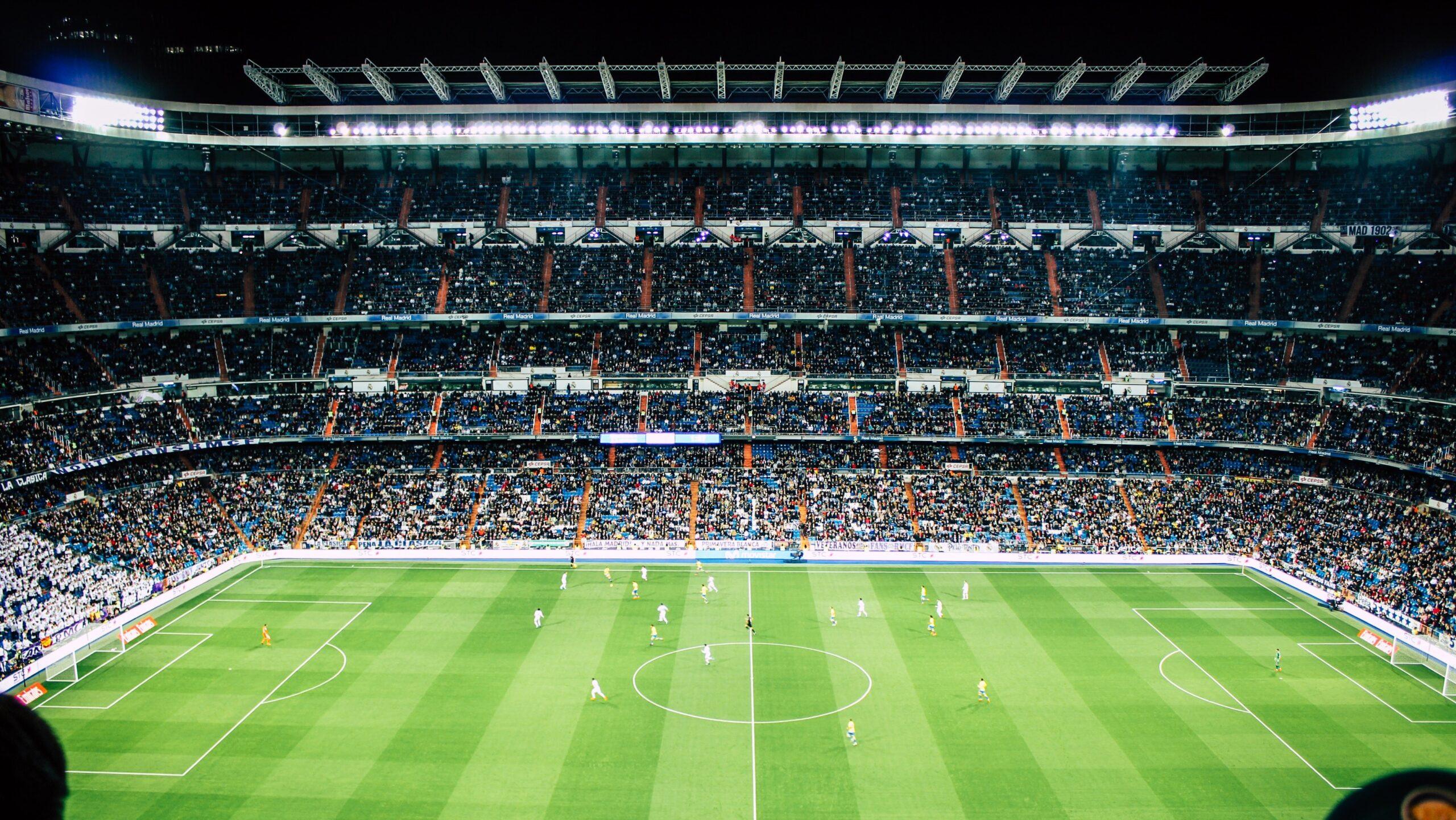 Real Madrid playing in a stadium.