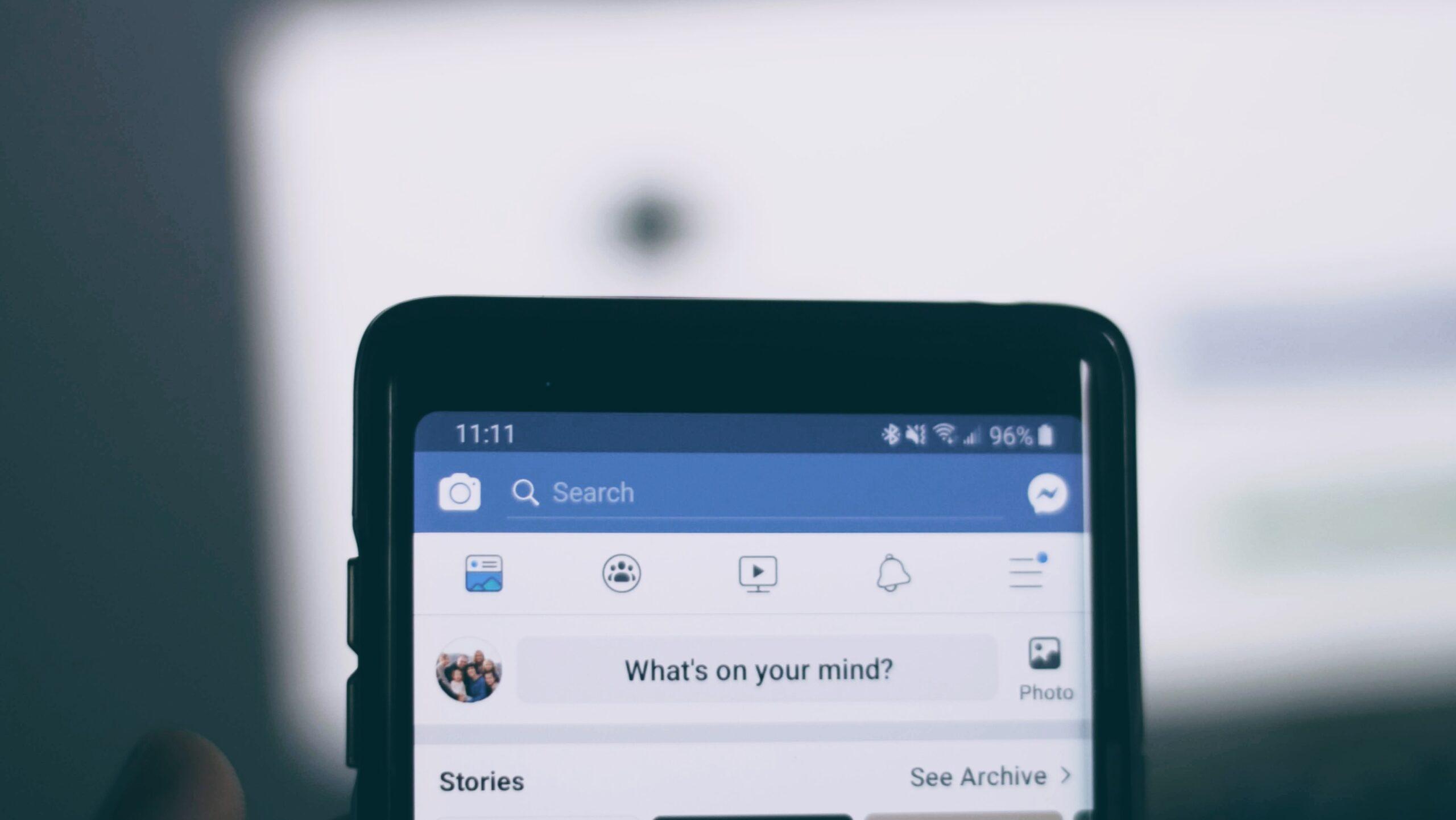 A smartphone displaying a Facebook page.
