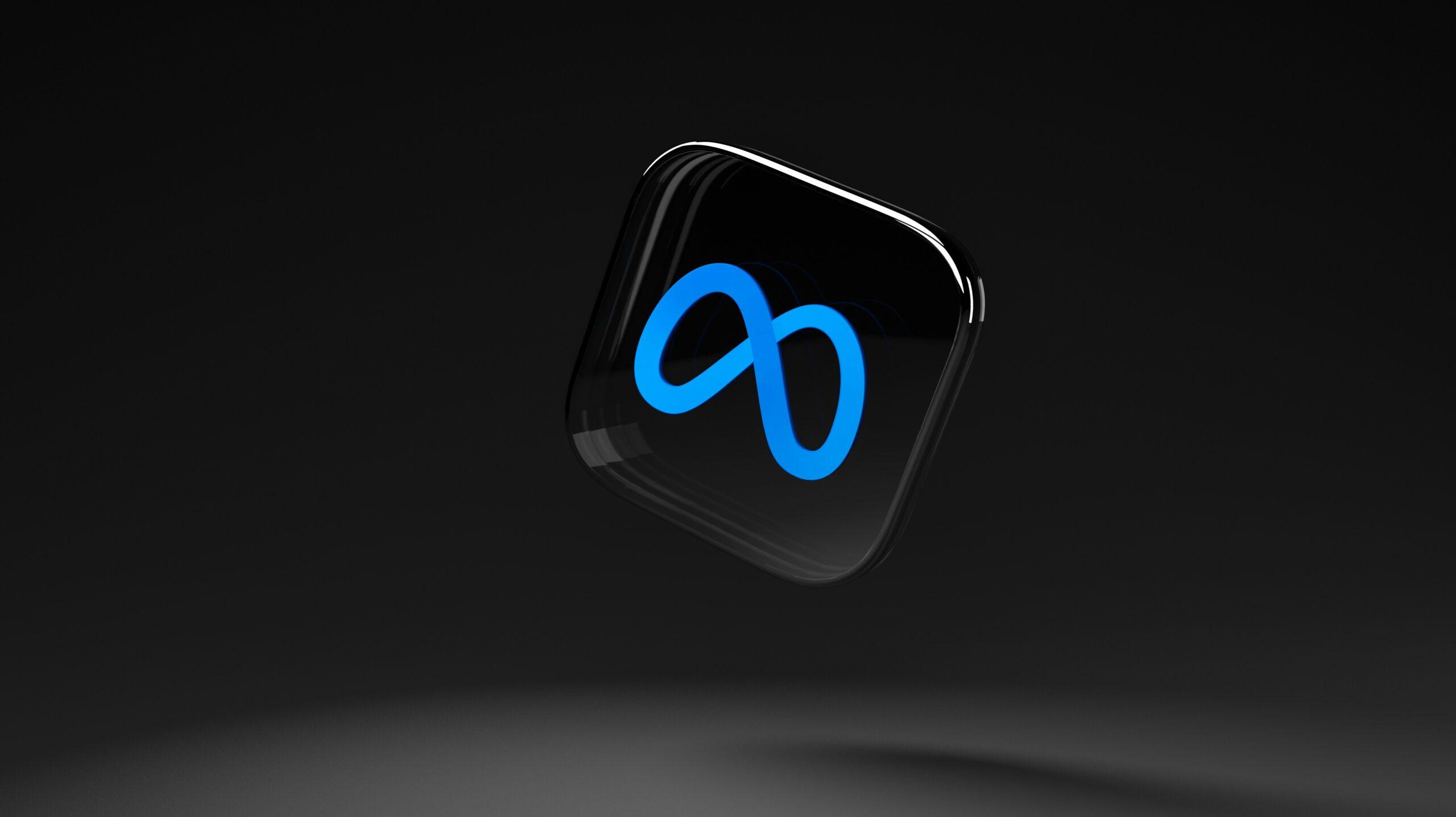 A blue-coloured Meta logo against a black background.