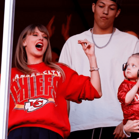 Taylor Swift cheering at a Kansas City Chiefs NFL match as part of an article about Taylor Swift at the Super Bowl.