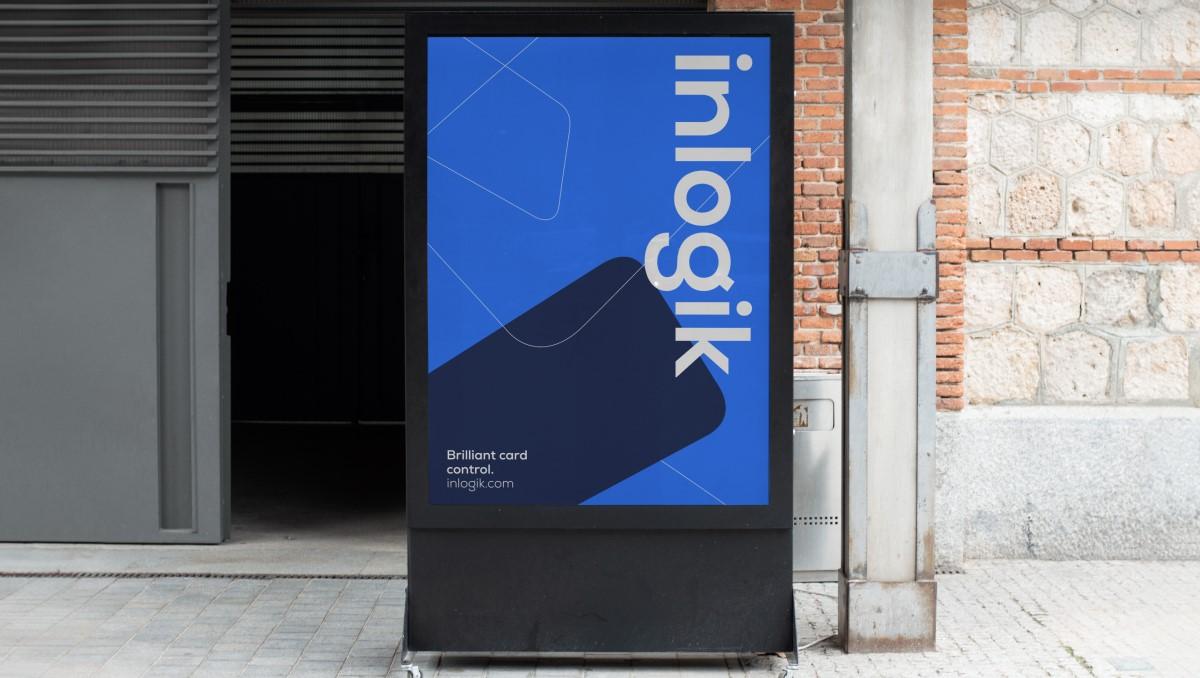 Graphic of Inlogik branding on a small billboard on a footpath.