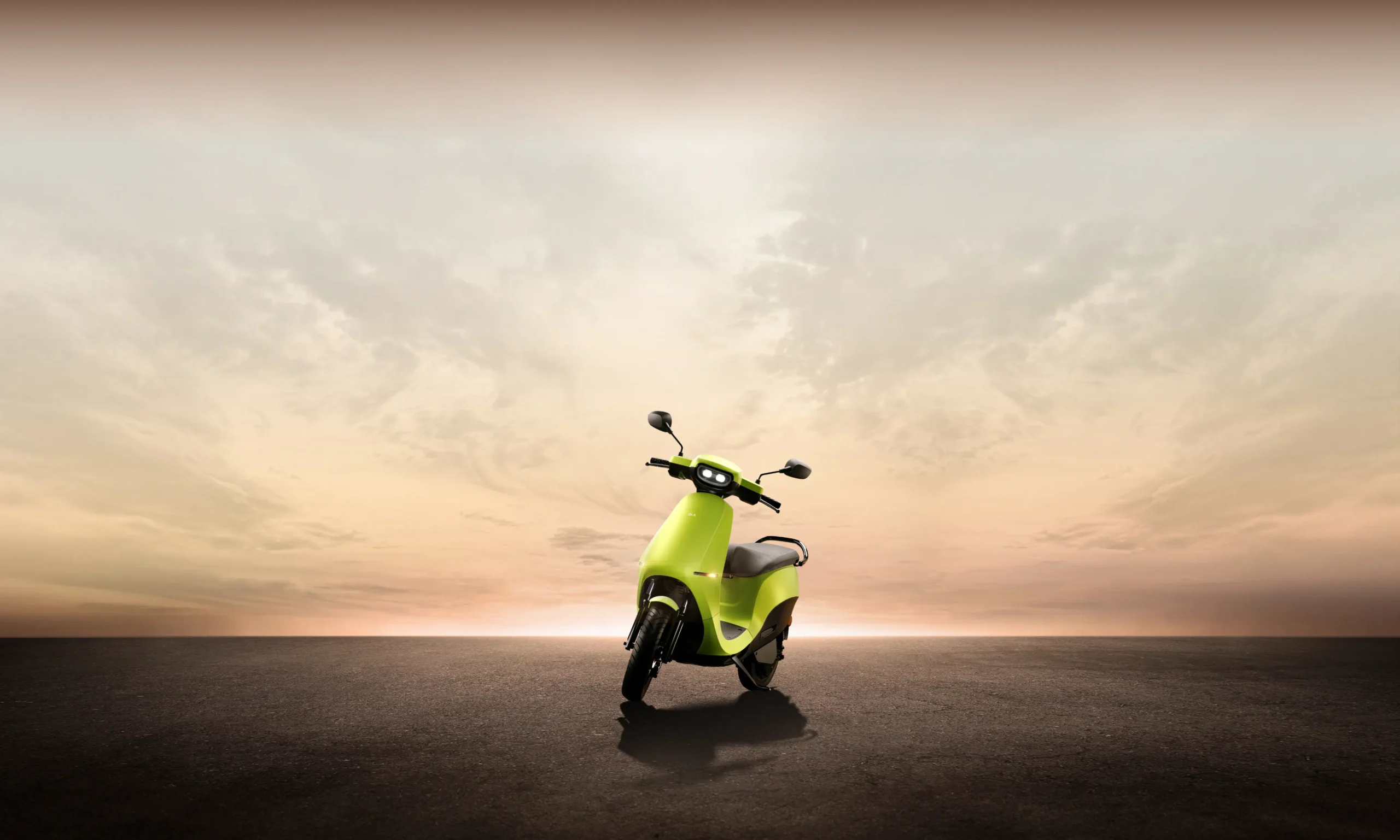 A lime green Ola Electric scooter upright against a backdrop of the sky and setting sun as part of an article about autonomous scooters.